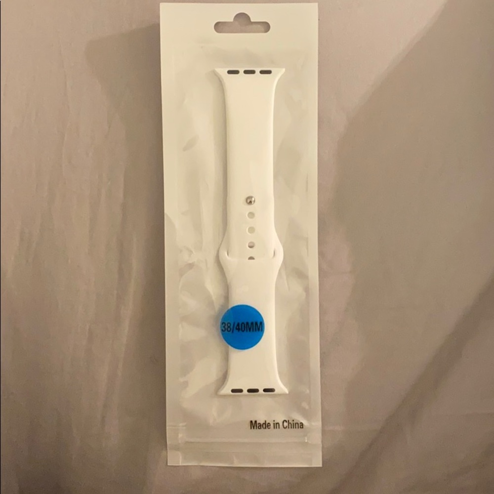White Apple Watch band.